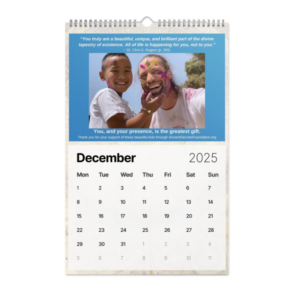 Discover the Ancient Secrets Love Calendar (2025), featuring a vibrant December page with an adult and child joyfully adorned in colorful paint, capturing creativity and unity.