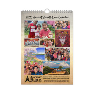 The cover of the Ancient Secrets Love Calendar (2025) features photos of smiling children, elephants, community gatherings, and artwork. Labeled "Ancient Secrets Foundation," it promotes cultural wisdom and kindness initiatives.